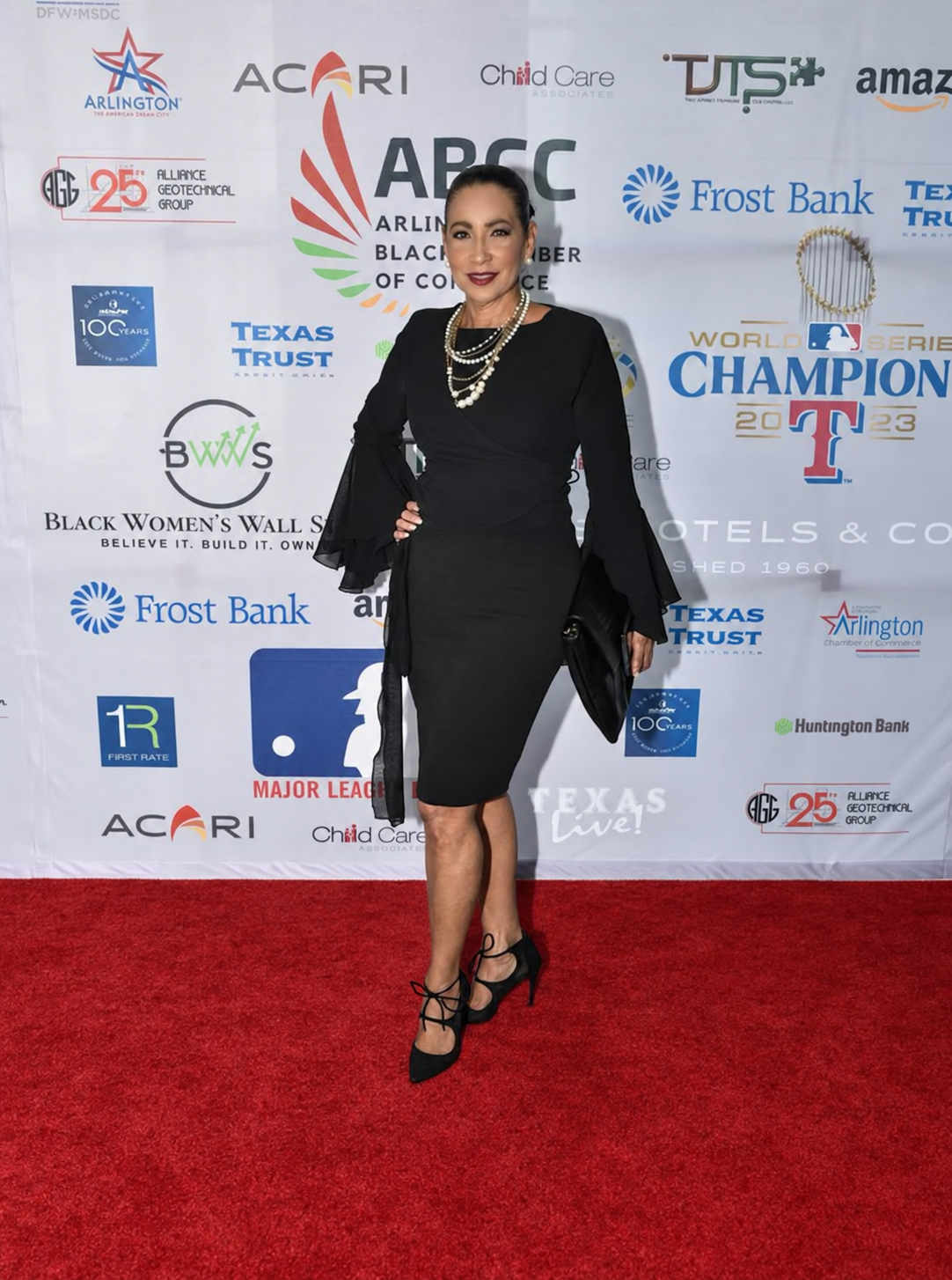 Dr. Renee Fowler Hornbuckle standing on the red carpet at a media event