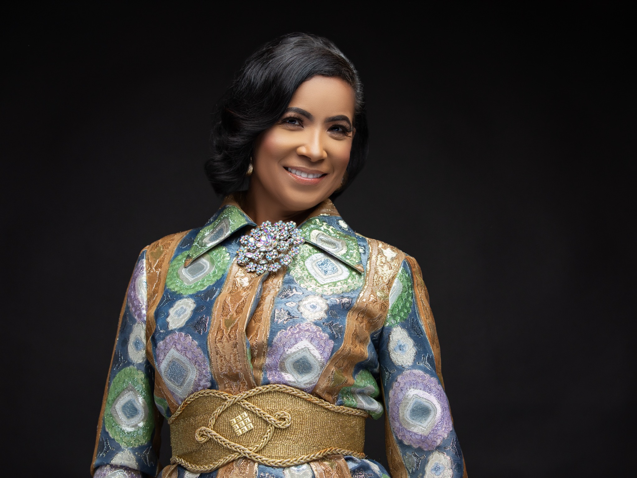 Dr. Renee Fowler Hornbuckle in a gold statement portrait
